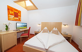 Hotel Glasererhaus - Vierbett Zimmer in Zell am See